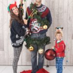stock-photo-christmas-christmas-tree-family-funny-christmas-decorations-humorous-awkward-ugly-sweater-winter-holiday-4daf4e3a-f5a5-437b-9755-a9e2b24564e2